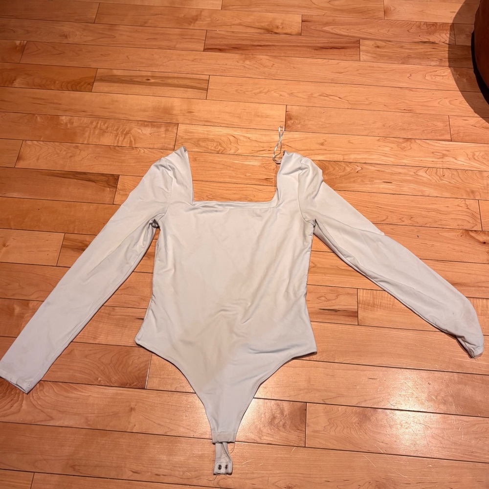Elegant Cream Long Sleeve Bodysuit